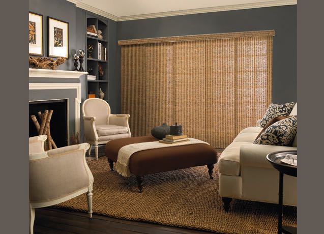 Austin Living room with navy walls and tan sliding panel tracks.